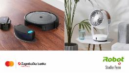 Robot cleaner on the floor and fan on the table